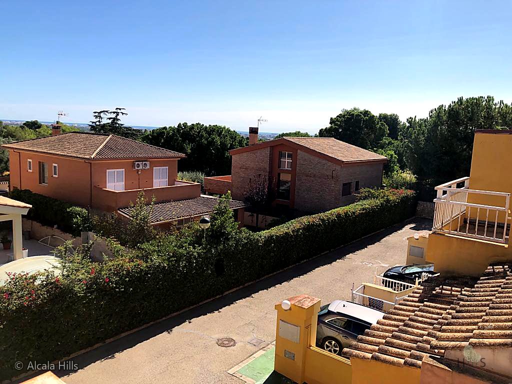 Elevated views over the leafy, low-density surroundings.